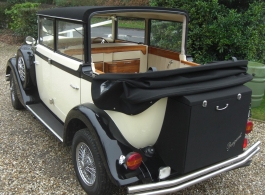 Ivory and Black vintage wedding car in Crowborough